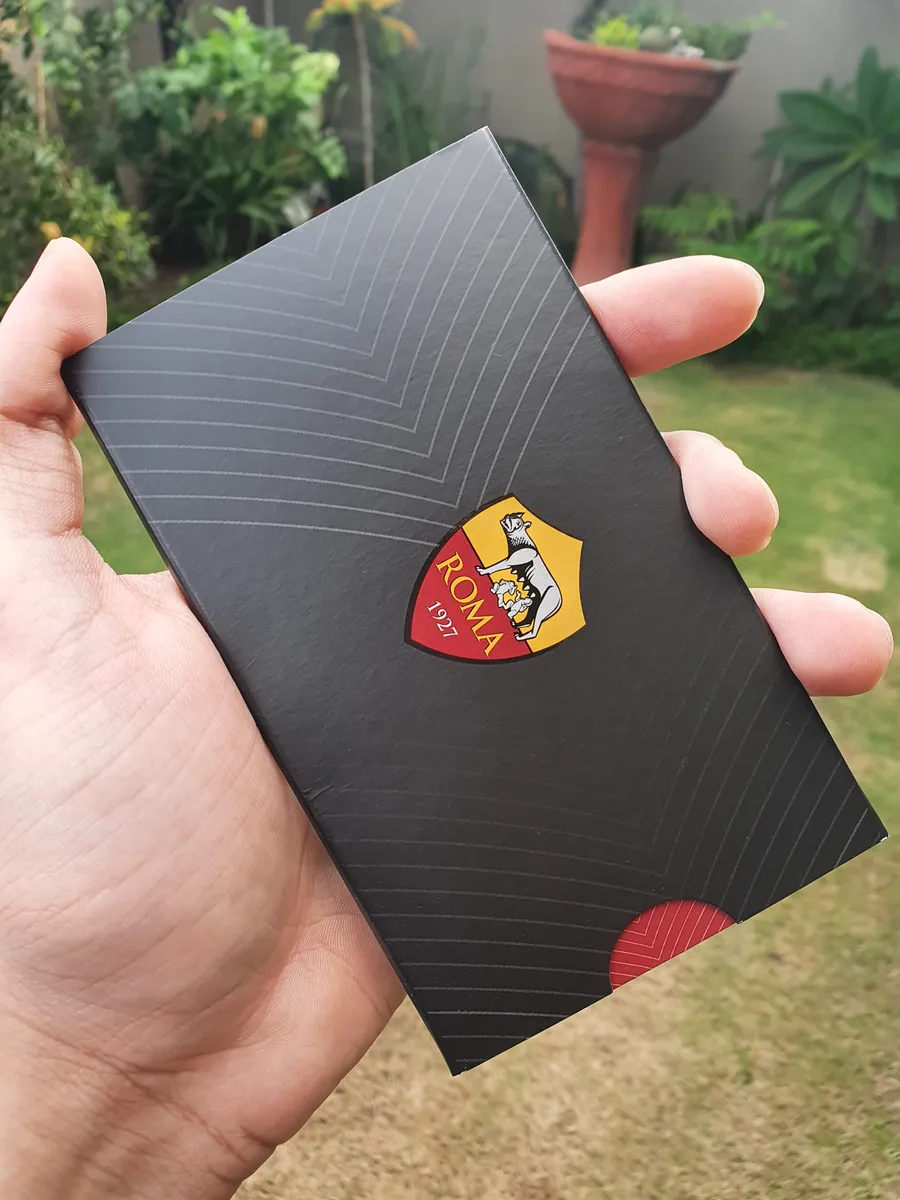 The black AS Roma card sleeve embossed with the club crest